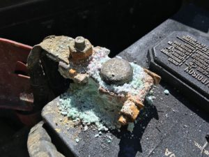 Photo of corroded car battery terminal